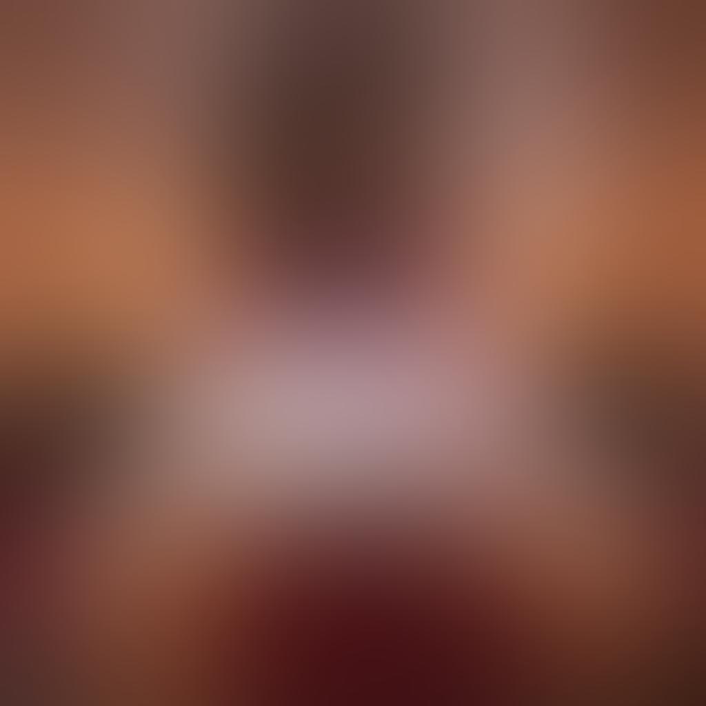 A captivating, sultry scene featuring a luxurious bedroom with soft, dim lighting, plush satin sheets, and tasteful erotic art on the walls. Include silhouette figures engaging in playful intimacy, surrounded by scented candles and rose petals to evoke a sense of indulgence. The atmosphere should feel inviting and tantalizing, encouraging exploration of pleasure. super-realistic. warm tones. intimate ambiance.